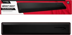 memory foam keyboard wrist rest on a wooden desk with hands resting naturally